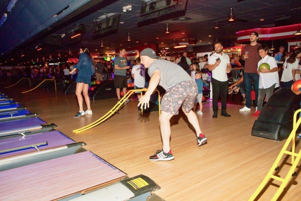 Astros infielder Alex Bregman goes for a strike at Bowlmor Houston during George Springer's All-Star Bowling Benefit. (Photo by Todd Parker, STP Images)