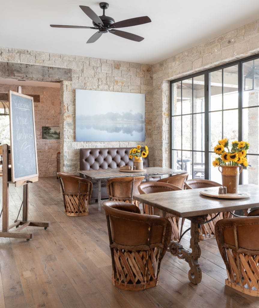 Mexican equipale chairs provide seating in a casual dining area of the main house. (Photo by Michael Hunter)