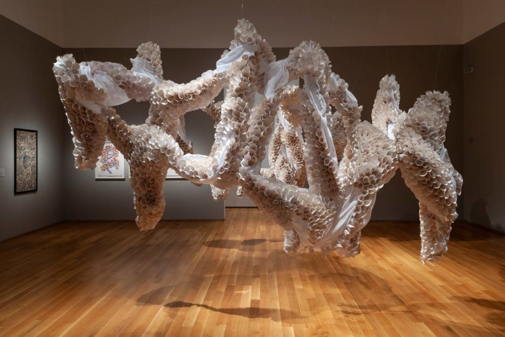 8,000 paper plates comprise Abhidnya Ghuge’s site-specific installation for “Site Lines: Artists Working in Texas,” at Asia Society Texas Center. (Photo by Paul Hester)