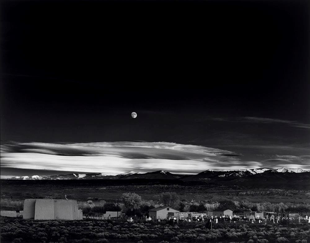 Ansel Adams' "Moonrise" (Hernandez, New Mexico, 1941) is one of many photographs in the MFAH's Shooting the Moon exhibit.