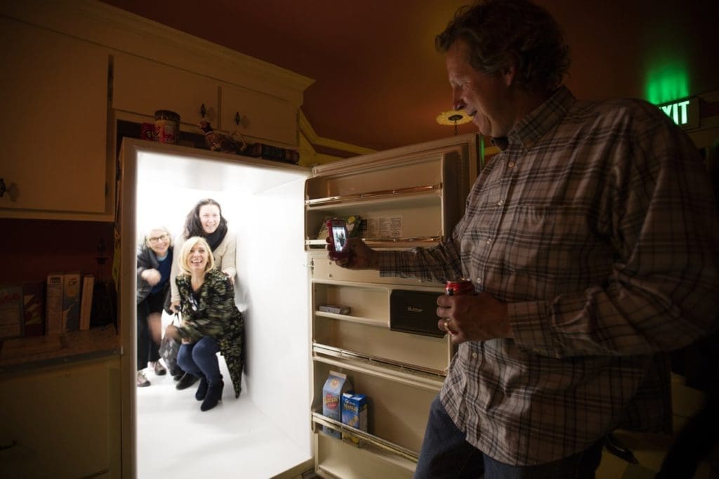 Visitors exploring Meow Wolf can 'disappear' through a refrigerator door. (Photo by Kate Russell, Courtesy of Meow Wolf)
