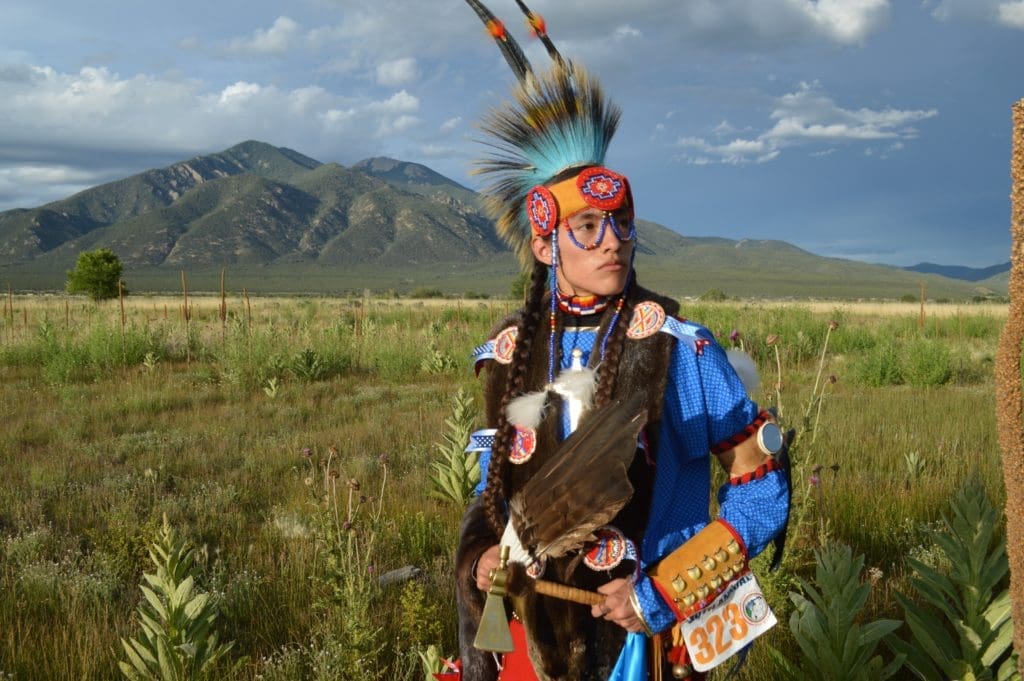 Taos Pueblo Indian in full regalia.  (Photo by TOURISM Santa Fe)