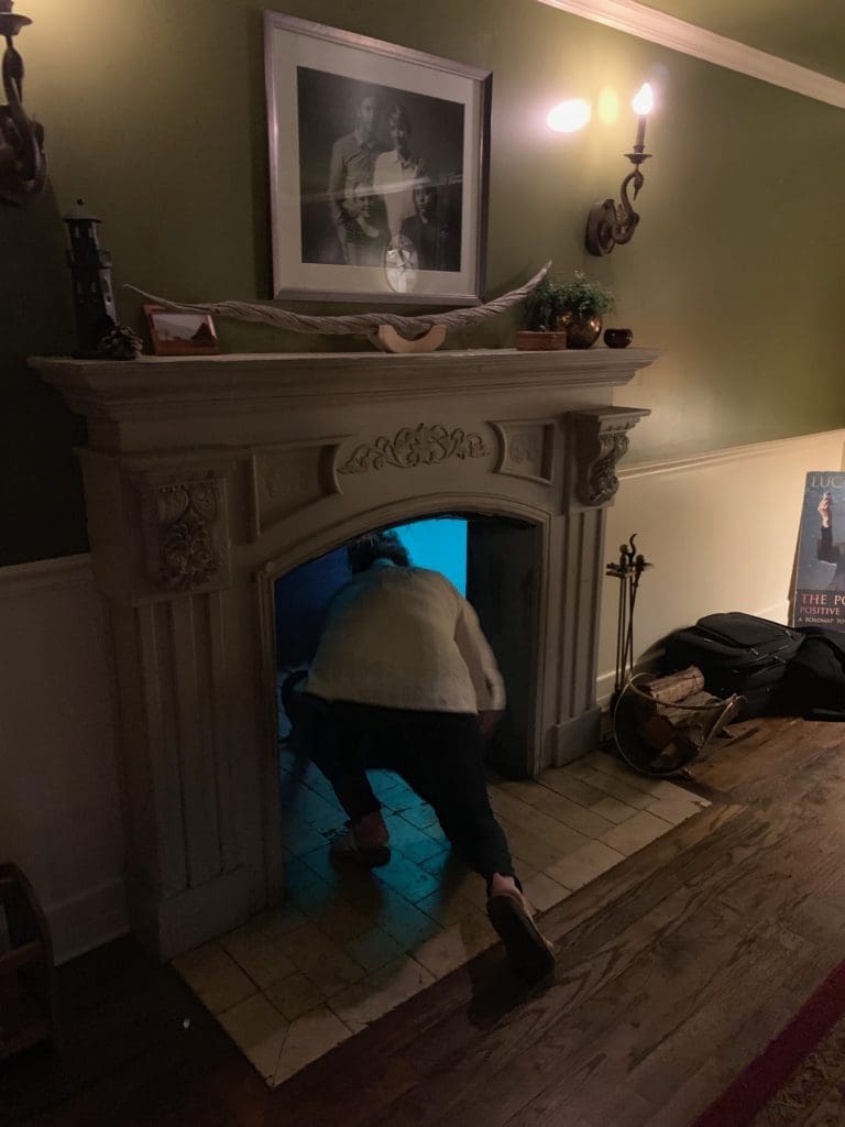 Visitors to Meow Wolf can disappear through a magical fireplace. (Photo by Tarra Gaines)