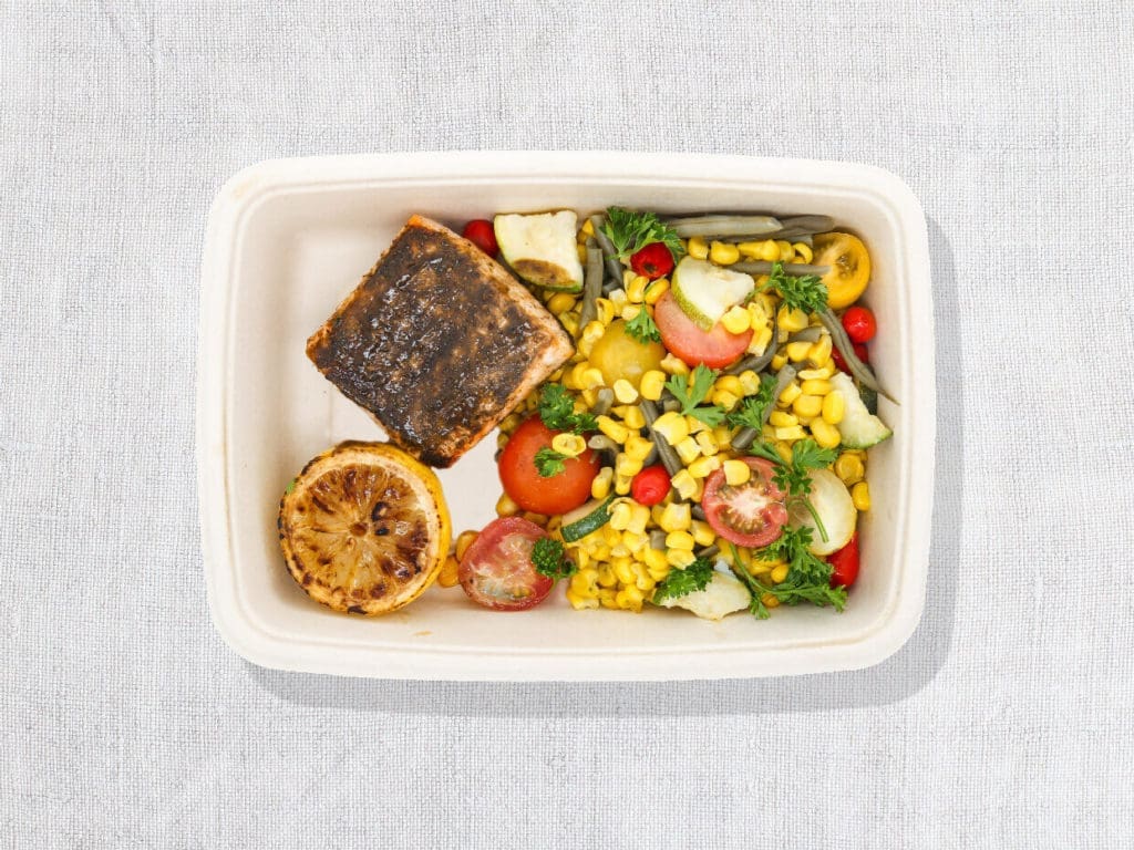 The roasted salmon & veggies includes a basil pesto.
