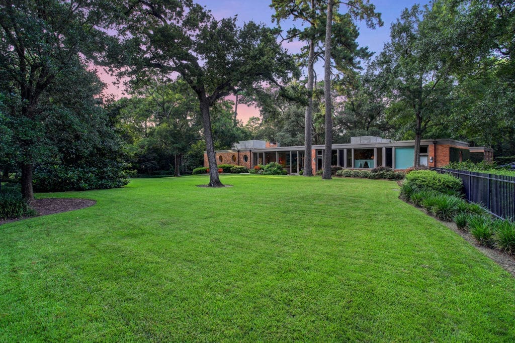 The house rests on more than 2.3 acres of lush landscaping. (Photo by TK Images)
