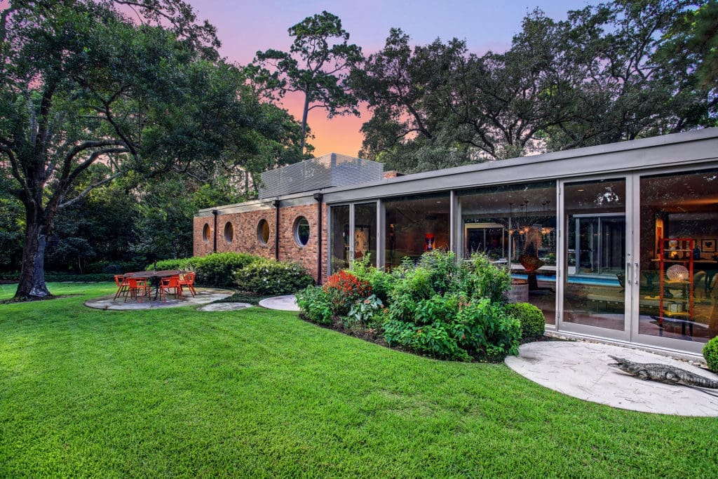 The mid-century masterpiece by Hugo Victor Neuhaus Jr., tucked on Lazy Lane in the heart of River Oaks, is privately on the market for more than $11 million. The sale is being handled by John Daugherty Realtors.  (Photo by TK Images)