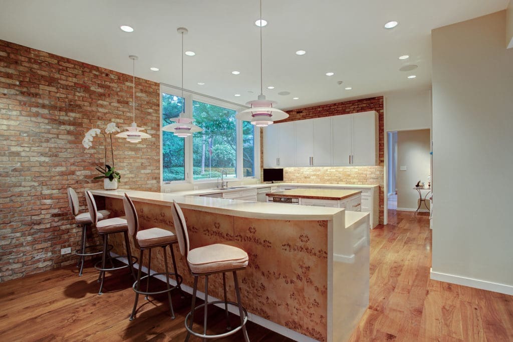 A breakfast bar looks into the kitchen. (Photo by TK Images)