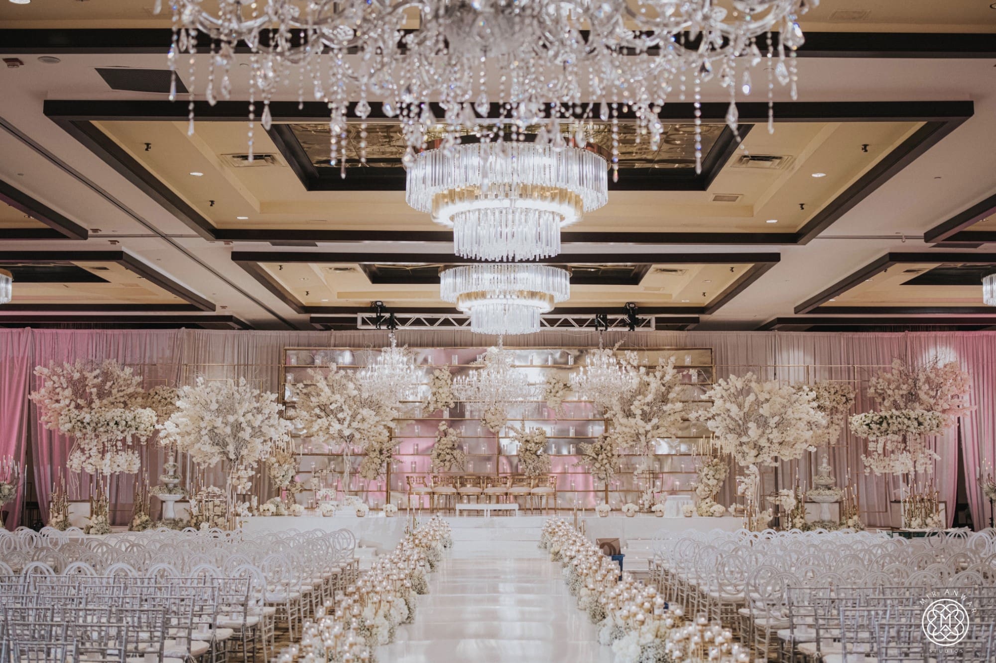 Lots of lights and large chandeliers made the ceremonies elegant and beautiful. (Photo by Mir Anwar Studios)