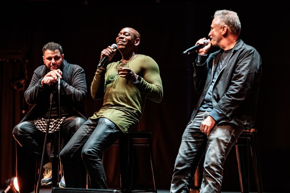 Mo Amer, Dave Chappelle, Jon Stewart on stage at Royal Albert Hall, one of Amer's most memorable shows. (Matthieu Bitton photo)