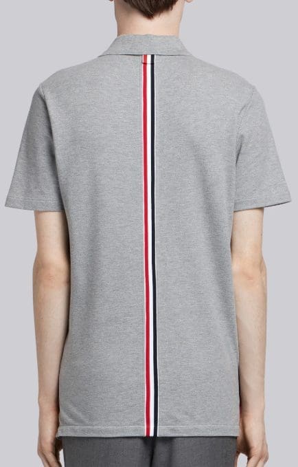 Thom Browne center-back stripe pique polo, available at Thombrowne.com and Traffic LA stores, $470.