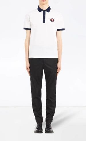 Prada pique polo, available at Farfetch.com, $550.