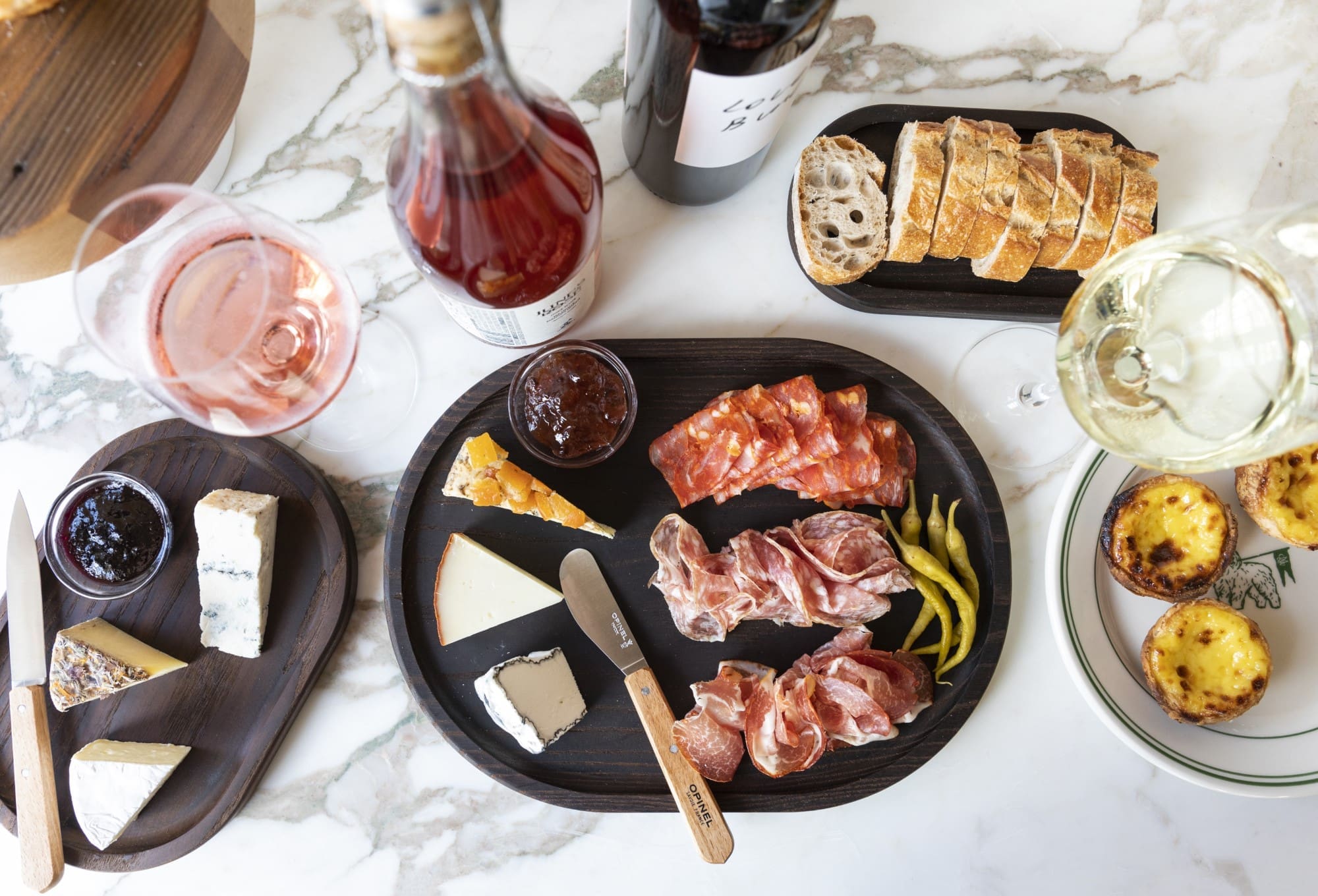 Montrose Cheese & Wine offers a variety of meats, cheeses and accoutrements for dining/snacking with wine selections.