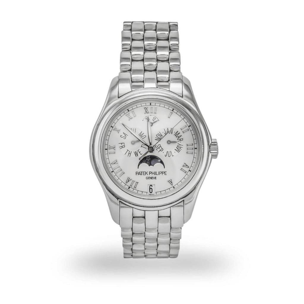 Patek Philippe Annual Calendar 5036 White Gold with 18K white gold link bracelet, exhibition back, and silver opaline dial with Roman numerals.
