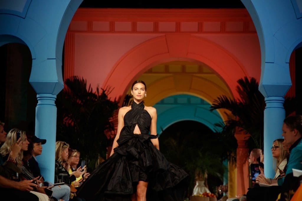 Model Irina Shayk closed the Oscar de la Renta runway show in a black high-low ruffled taffeta gown that wrapped at the neck. (Photo courtesy of Oscar de la Renta)