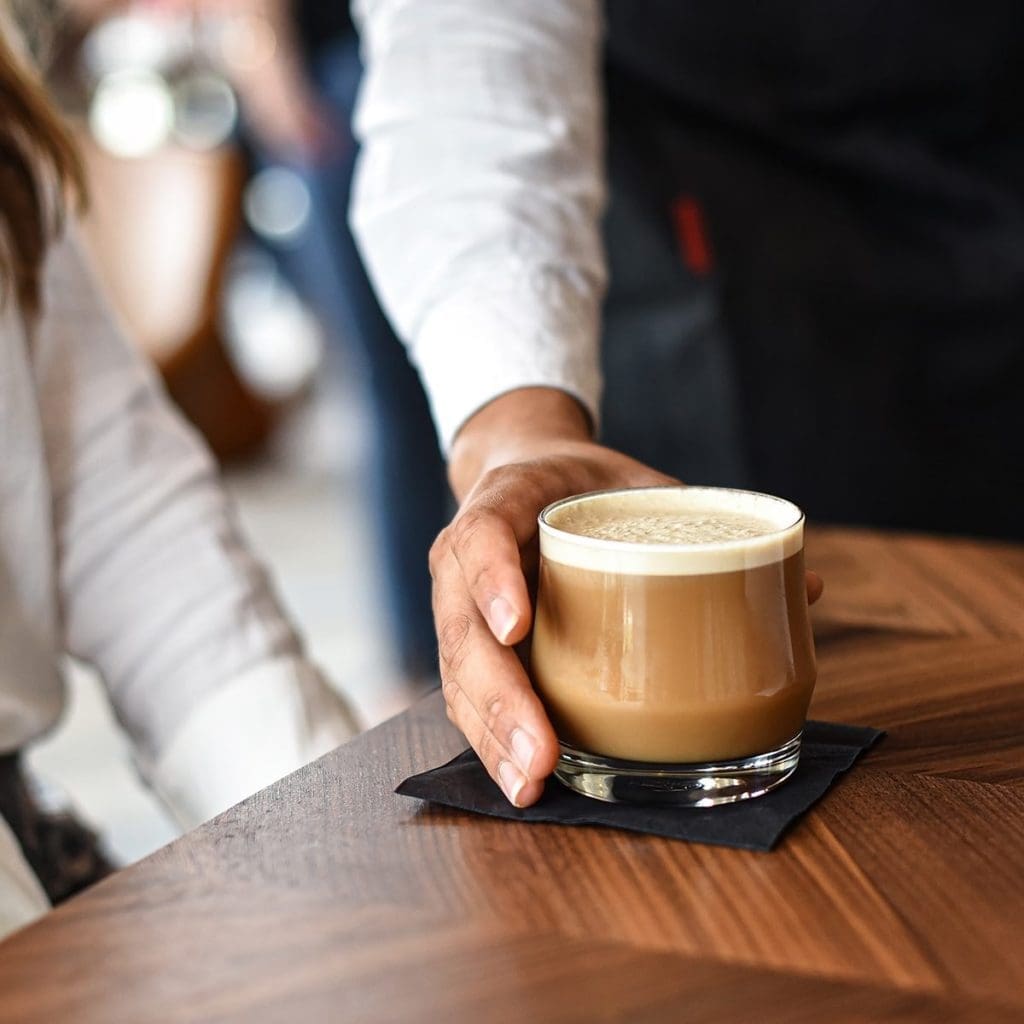 The Draft Latte at Ascension is a cold summer brew with frothy foam. Courtesy of Ascension