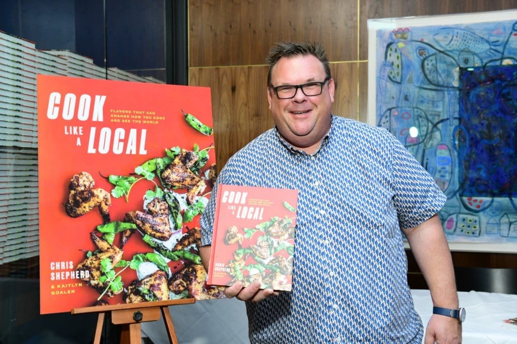 Chef Chris Shepherd celebrates  his cookbook, 'Cook Like a Local.' Starting in September he will be cooking on Zoom from his favorite cookbooks by other authors. (Photo by Daniel Ortiz)
