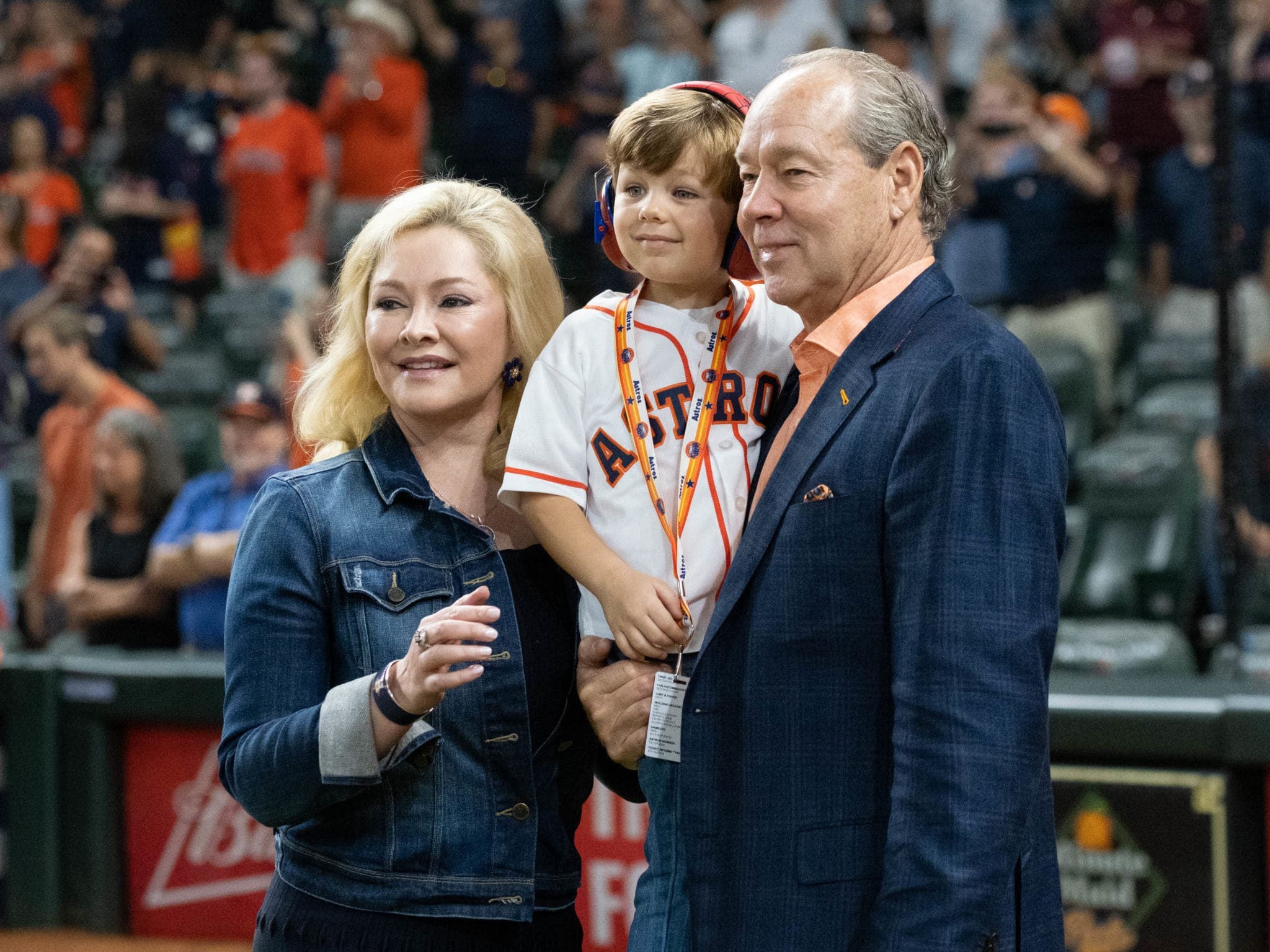 Whitney and Jim Crane made sure their young son experienced the Astros' celebrating ways. (Photo by F. Carter Smith)