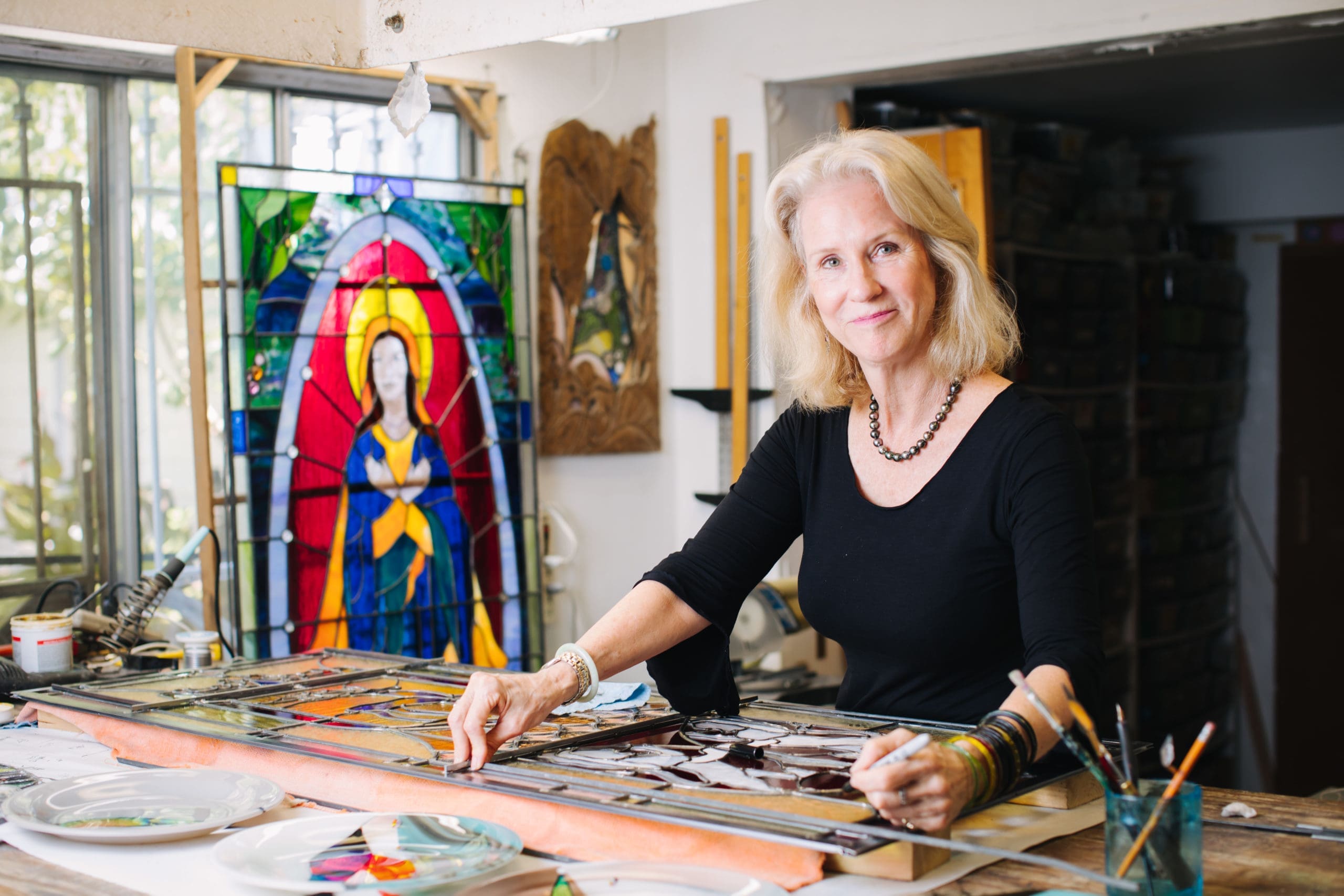Glass artist Kim Clark Renteria in her House of Luminosity, (Photo by www.ThaninPhoto.com)