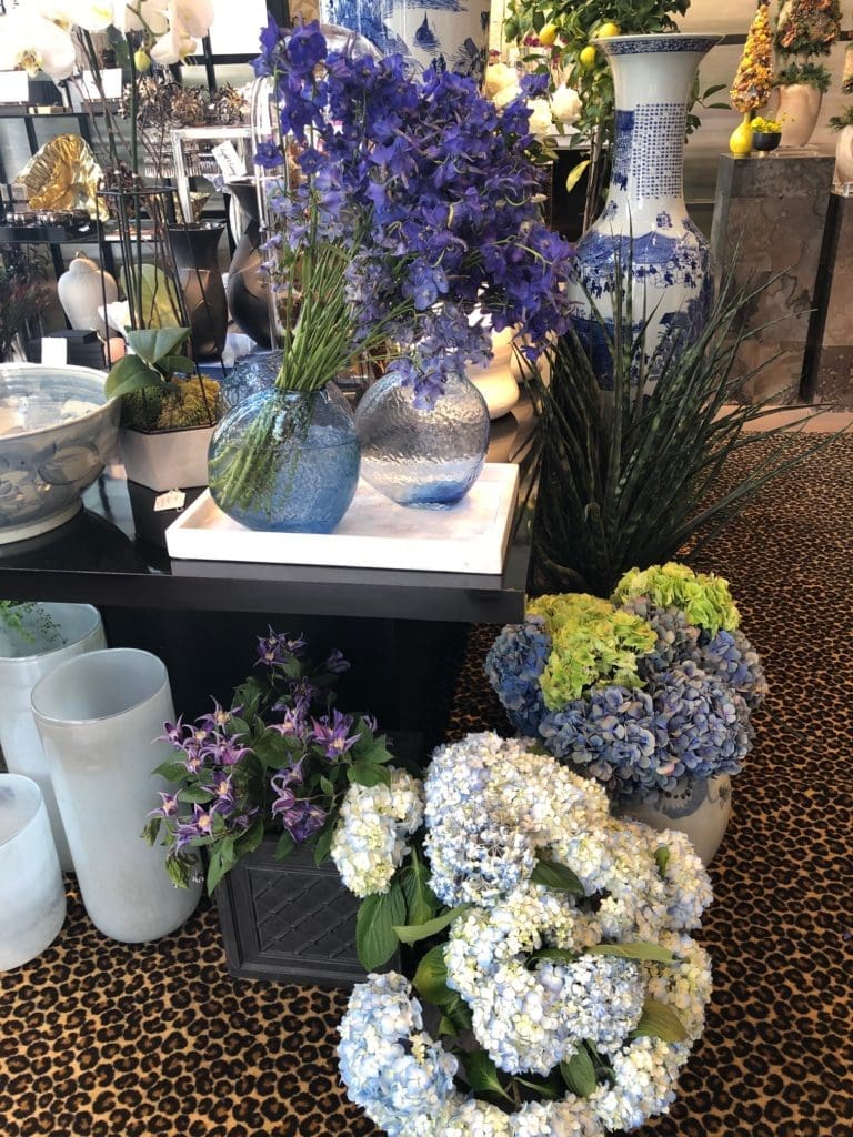 Delphiniums, hydrangeas and Japanese urns invite adoration.(Photo by Shelby Hodge)