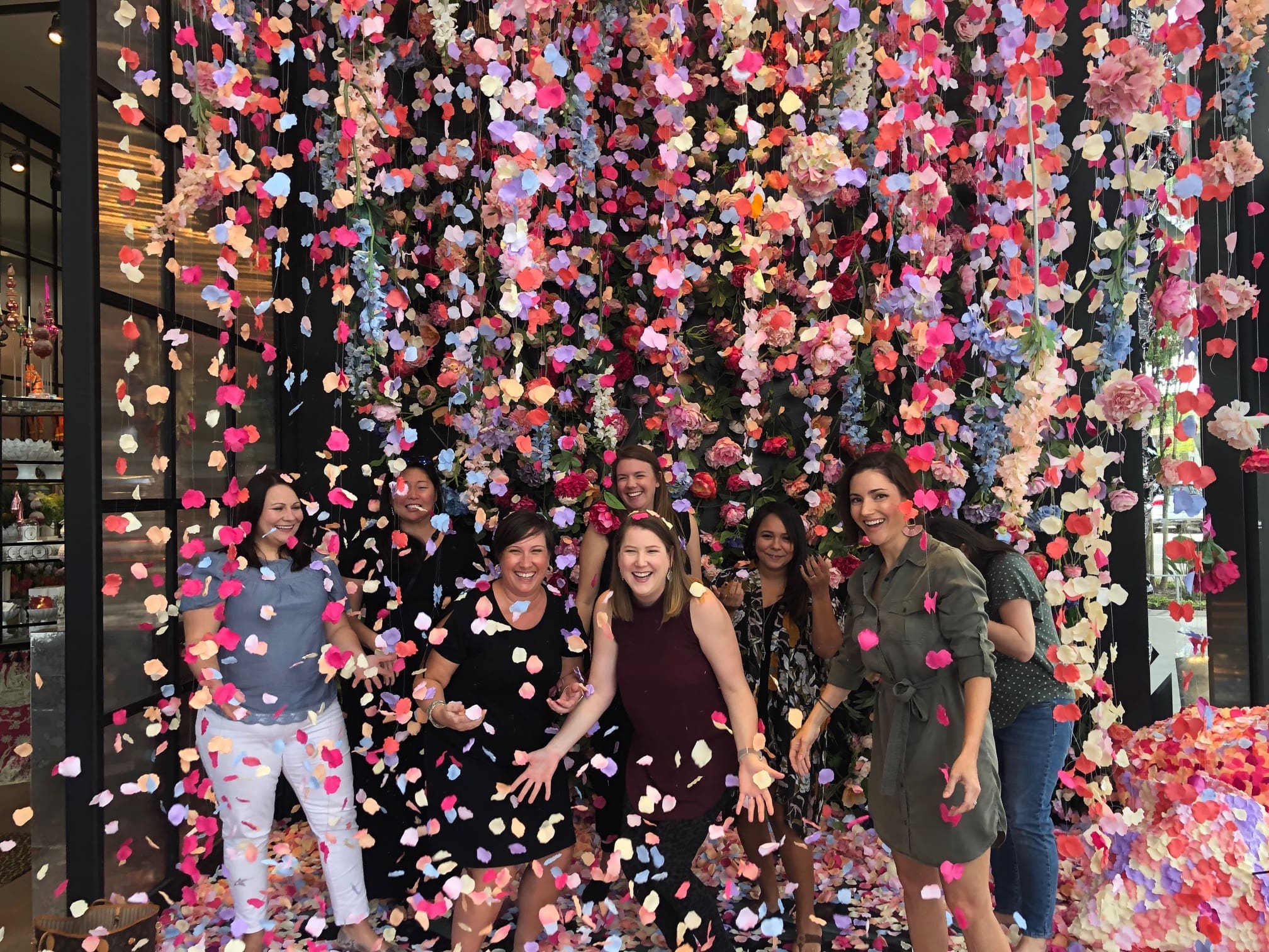 The 'Flower Rain' photo installation in conjunction with Motus Red Photo Booth in Avant Garden in River Oaks District is a hit with the Instagram set.  (Photo by Shelby Hodge)