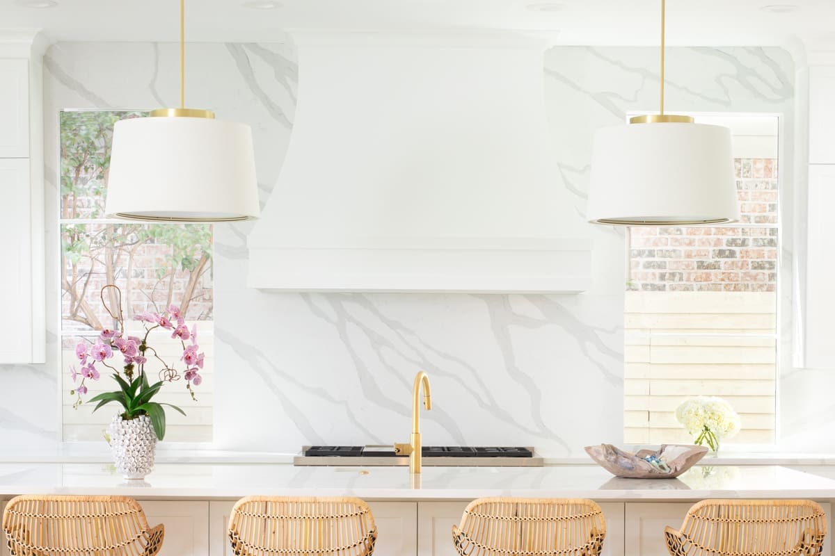White oak floors and cabinetry make brass hardware and fixtures stand out. (Photo by Jenifer McNeil Baker)
