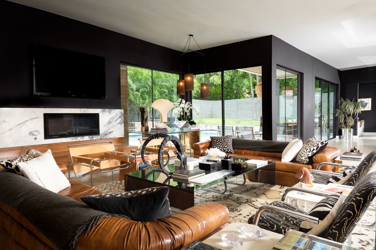 Bold furniture and statement art make up the space. (Photo by Jenifer McNeil Baker)