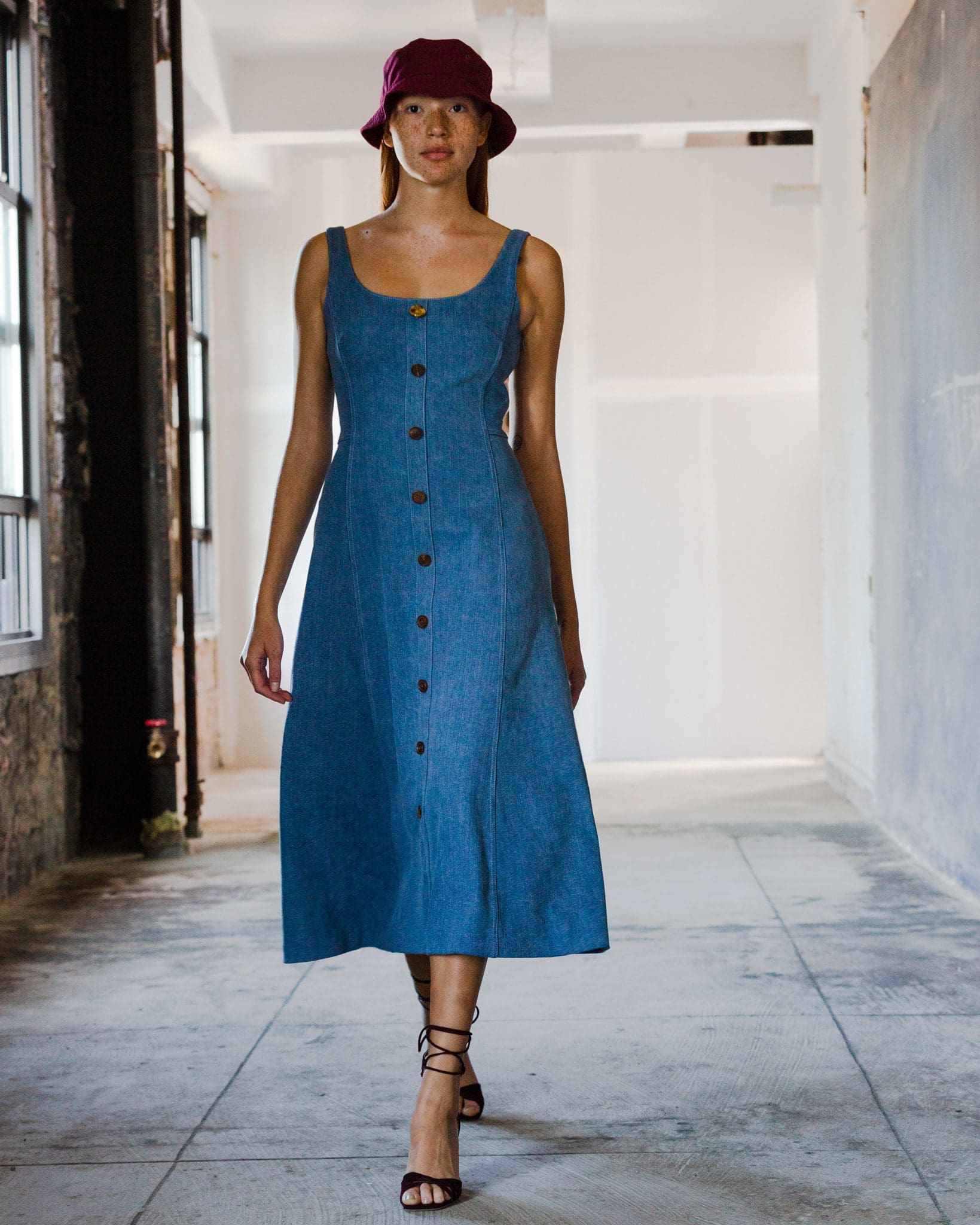 Adam Lippes sun-bleached light denim dress, burgundy suede ankle tie-told heel. (Photo courtesy of Adam Lippes)