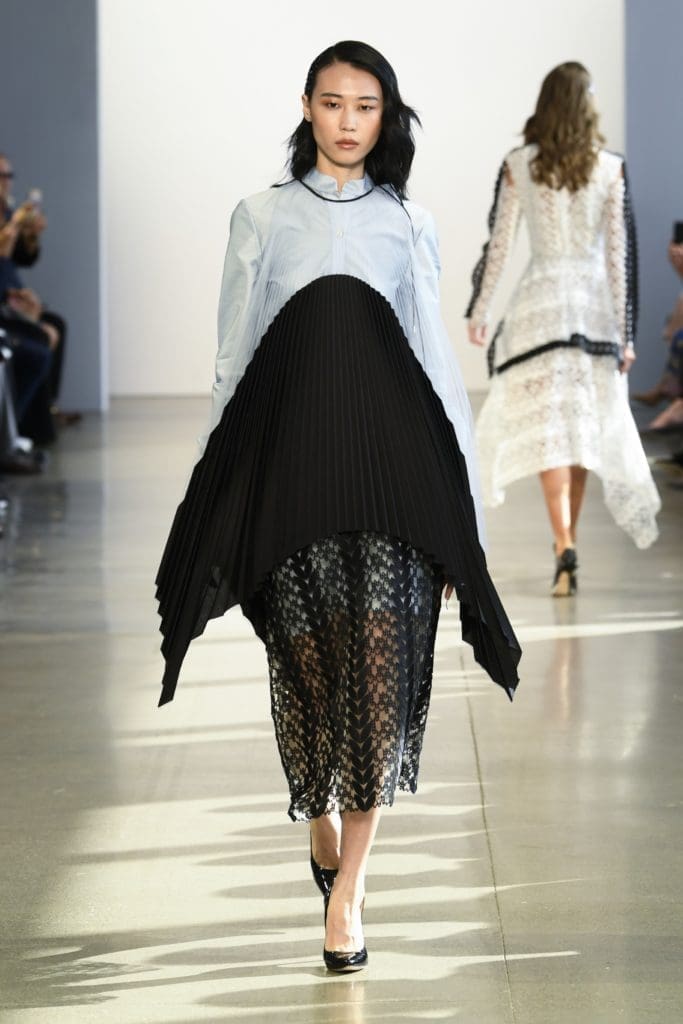 Bibhu Mohapatra sky cotton tunic shirt under black vine guipure skirt and pleated tulle and cotton cardigan. (Photo courtesy of Bibhu Mohapatra)