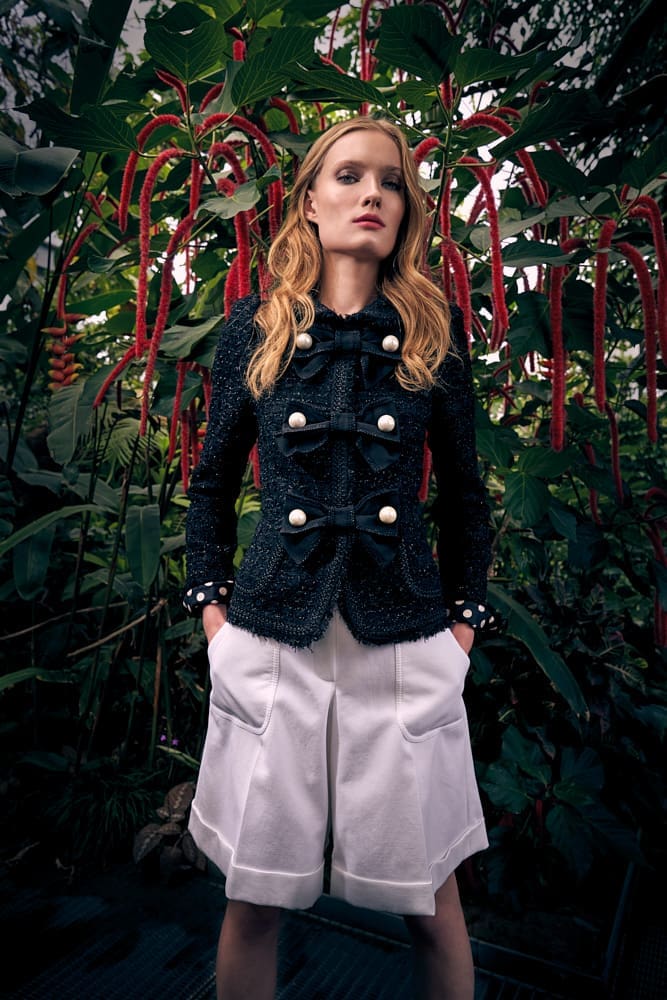 Maison Common tweed jacket with bow and pearl detail, cotton short. (Photo courtesy of Maison Common)
