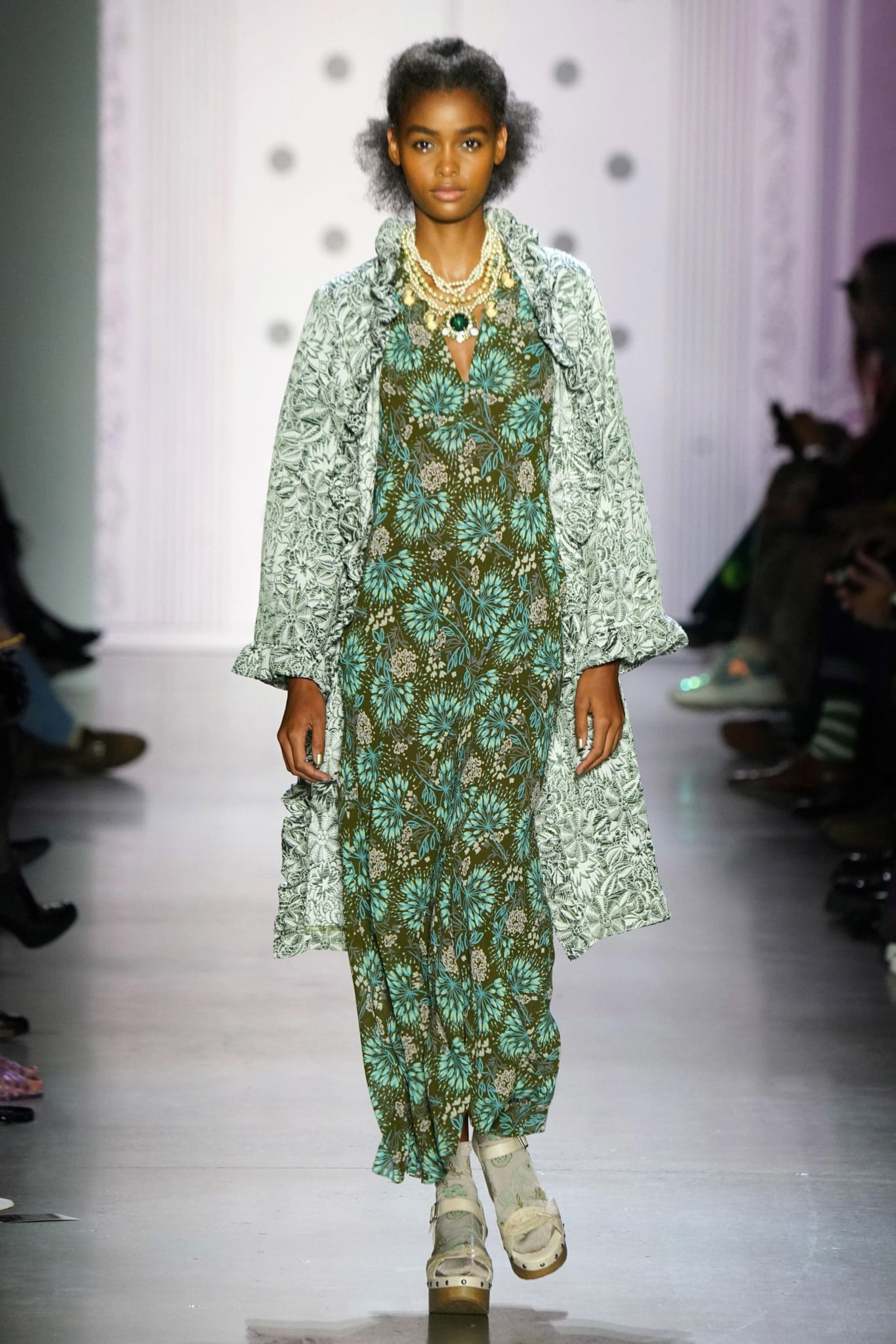 Anna Sui olive multi jungle gardenia jacquard coat and multi firework garden dress. (Photo by Thomas Lau courtesy of Anna Sui Design Studio)