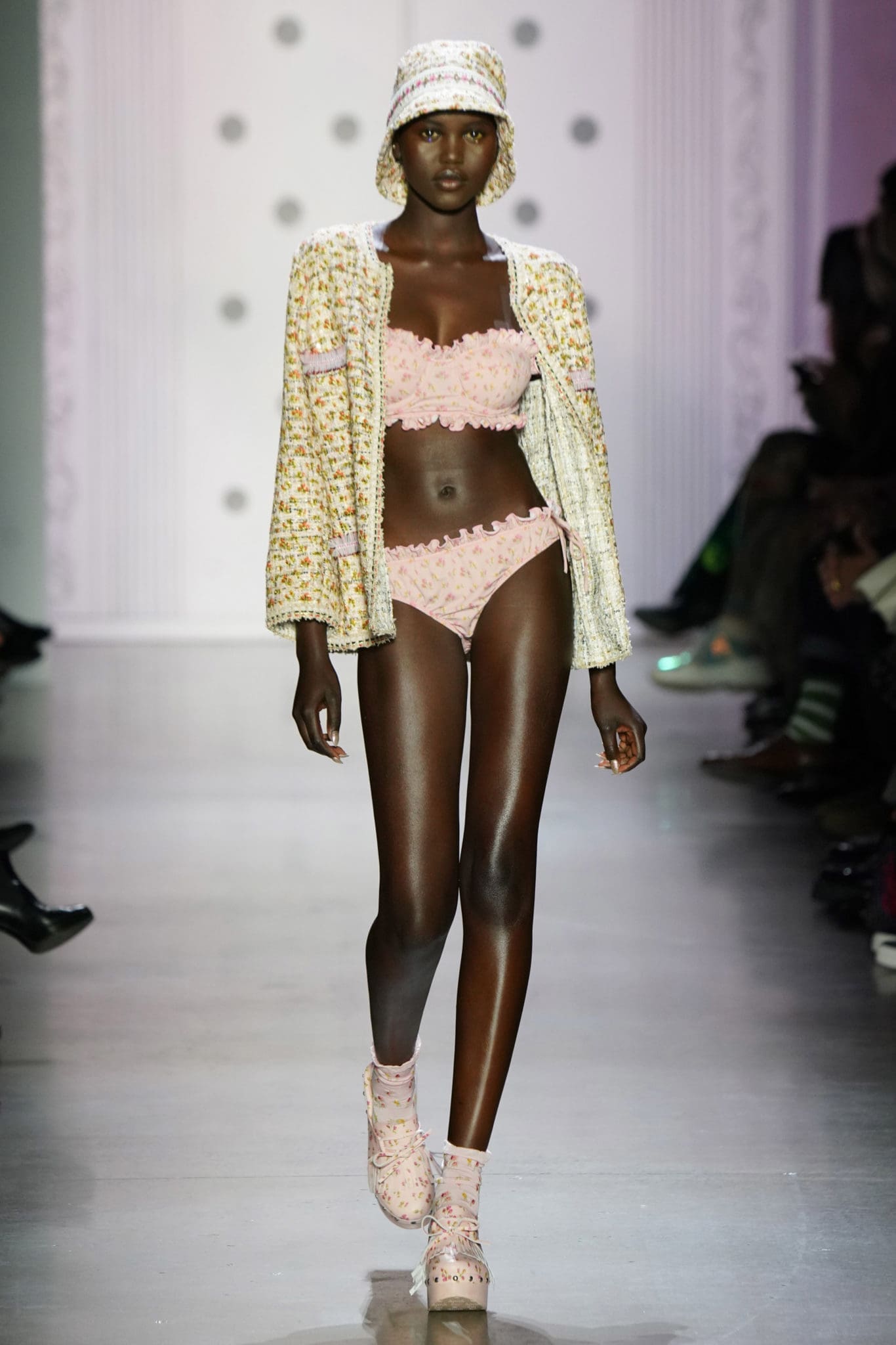 Anna Sui blush multi rosebud tweed jacket and contrasting bikini. (Photo by Thomas Lau courtesy of Anna Sui Design Studio)