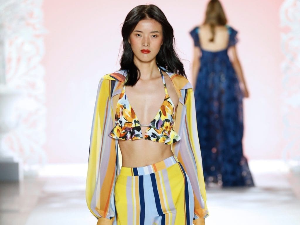 Badgley Mischka striped trousers, striped blouse, floral bralette. (Photo courtesy of Badgley Mischka)