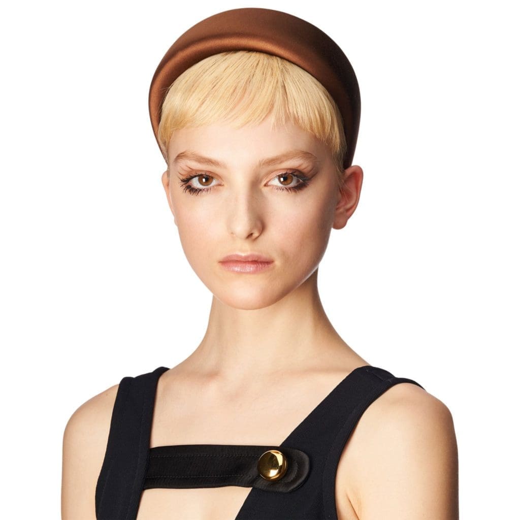 Slip seamlessly into fall with the addition of a headband like this by Prada.