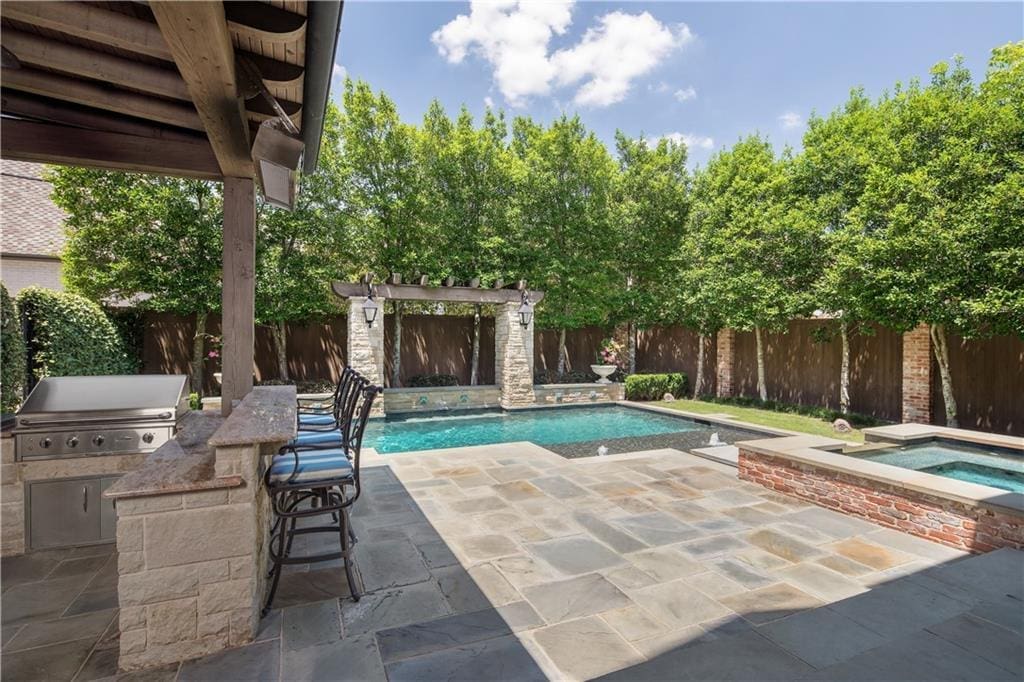 The oversized backyard has its own living space. 