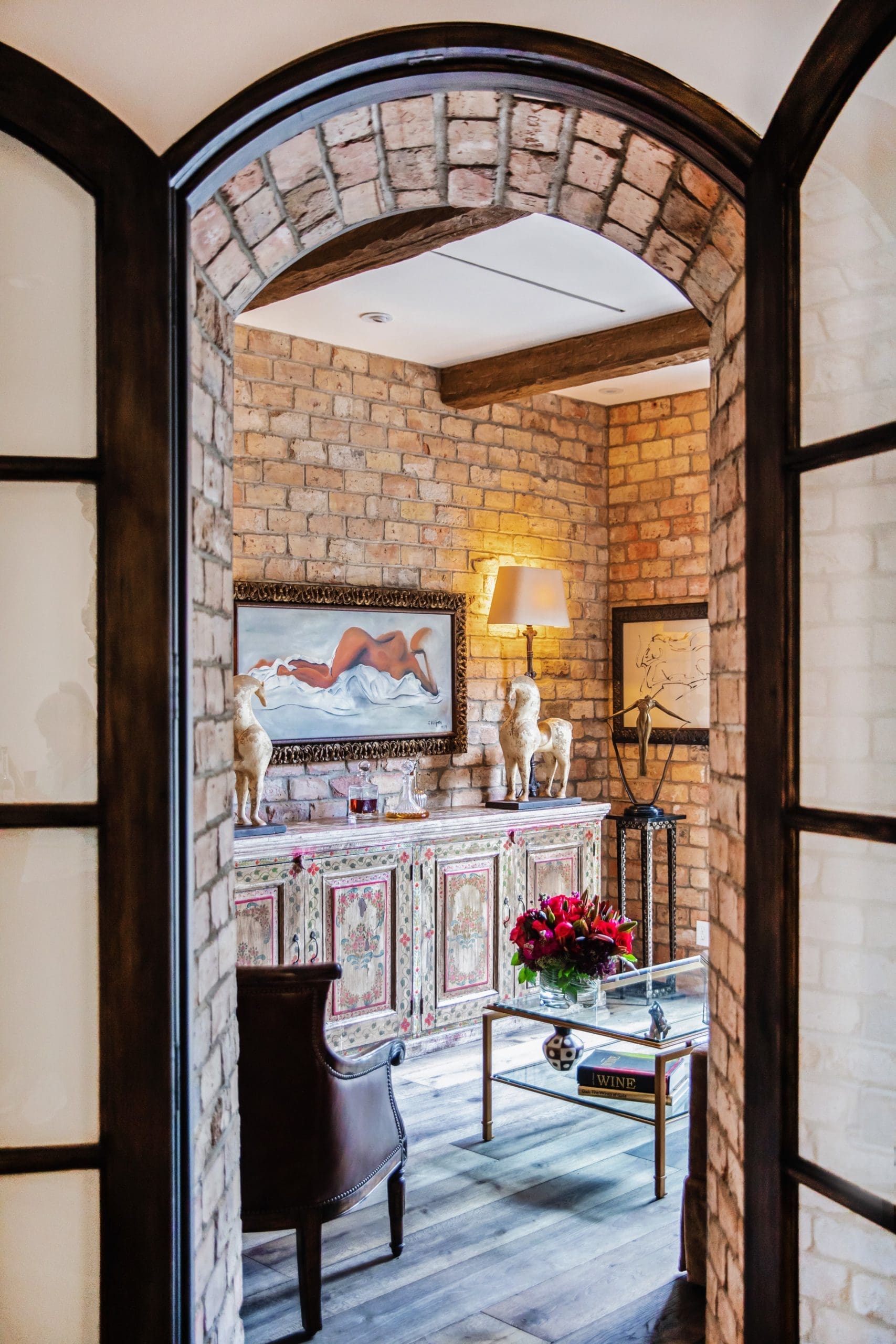 The cozy brick room just off the entry is jokingly referred to as an invitation only space to relax. No phones allowed.
