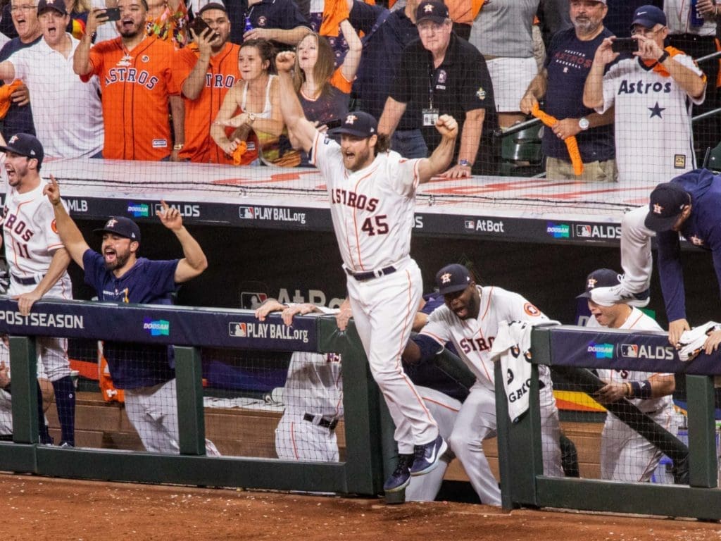 Gerrit Cole got some air time on his dugout leap after the Astros won Game 5 vs. Tampa. (Photo by F. Carter Smith)
