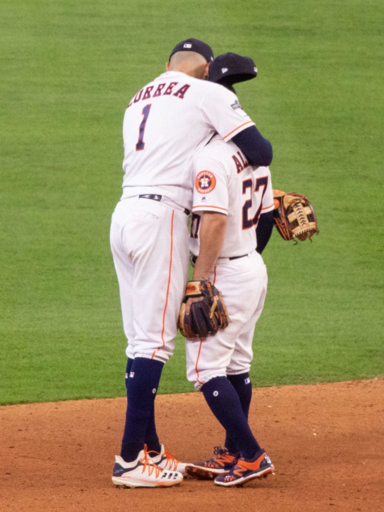 Carlos Correa knows that Jose Altuve deserves plenty of love for his playoff heroics. Now Correa is back with the Astros and Altuve. (Photo by F. Carter Smith)