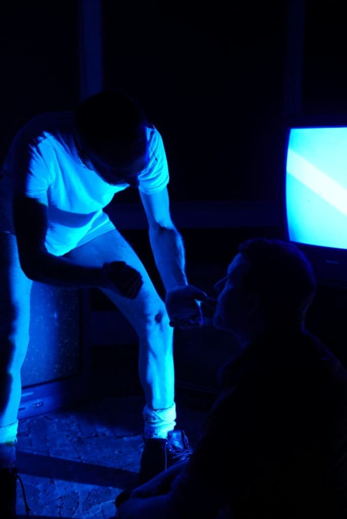 In the light of static televisions you will be required to drink. (Photo by Jeromy Barber)
