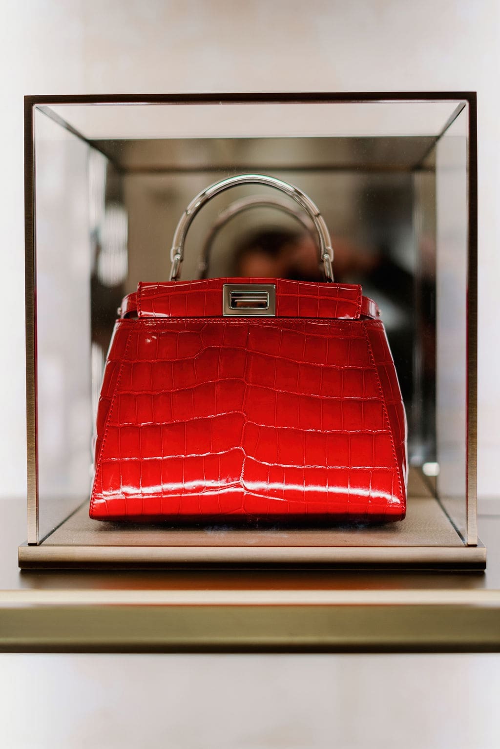 Fendi's lustrous Peekaboo Iconic Mini red crocodile leather bag (Photo by Joseph West)
