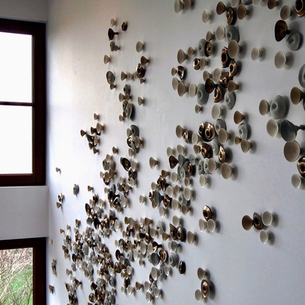 Wall installation by ceramic artist Jennifer Prichard.