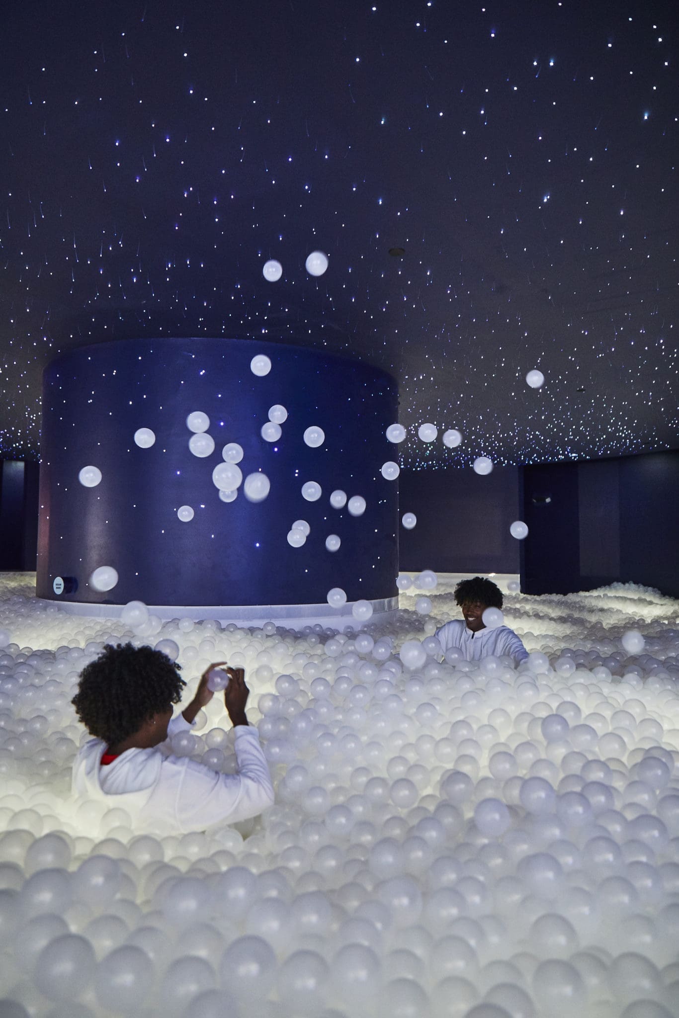 The final room is an homage to NASA, with a large ball pit “inspired by the moon and galaxy that surrounds it.” The pit contains 40,000 plastic balls with 50,000 fiber optic lights to create a moon-like atmosphere. (Photo by Cody Bess)
