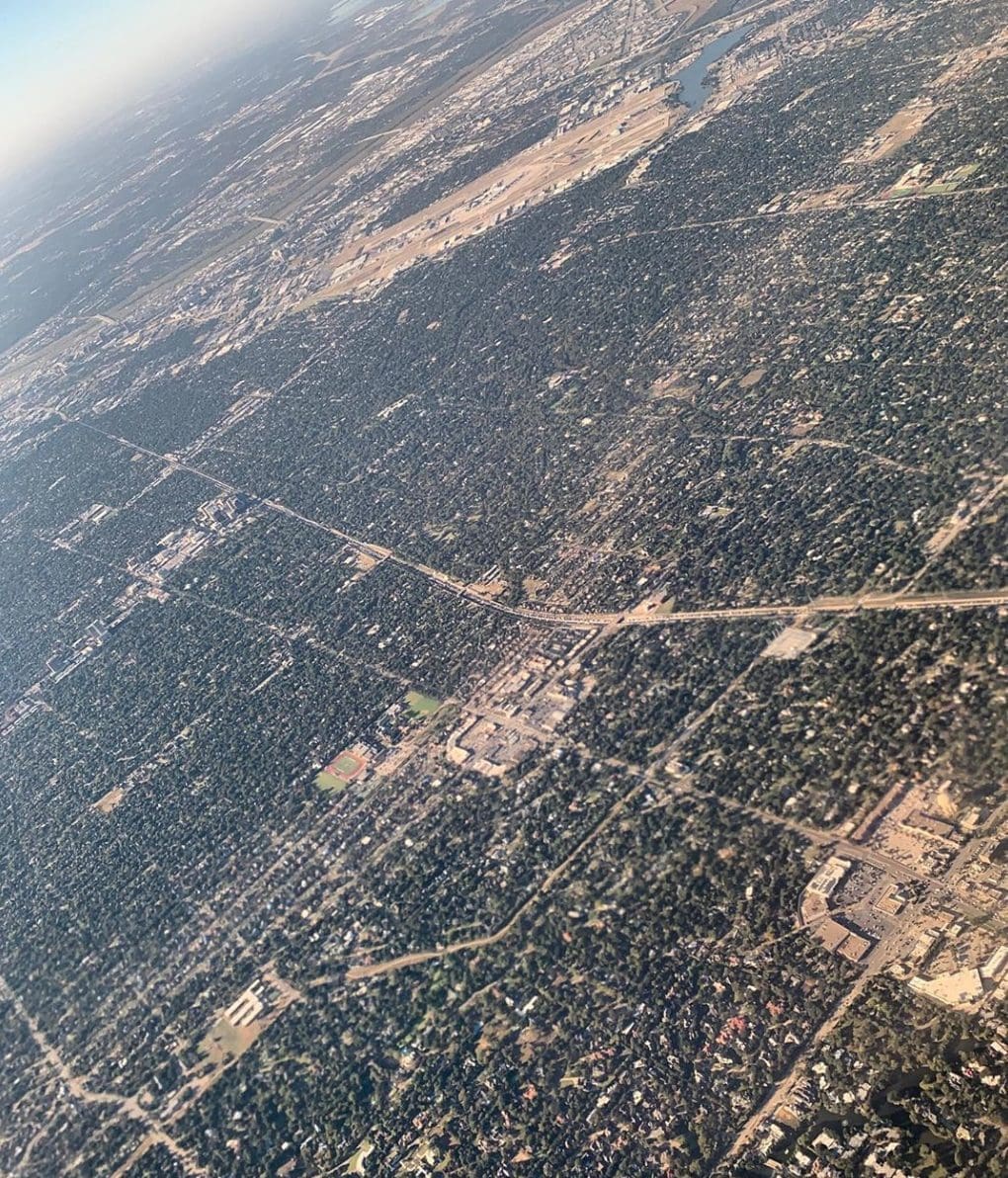 An aerial view of the tornado's path of destruction. Preston Royal shopping center in the middle. Photo by @storms_kat