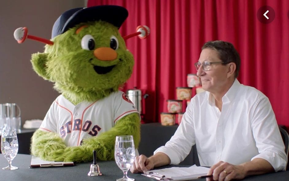 H-E-B president of food and drug stores makes friends with Astros mascot Orbit (Facebook photo)