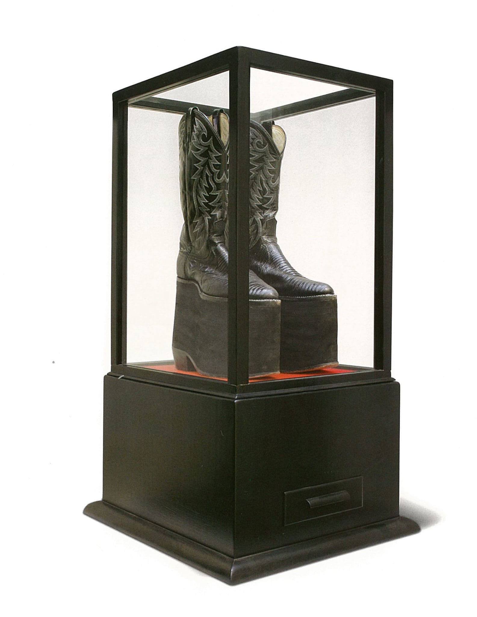 “Height Like Mike: The Boots,” 2004-2005, sponsored by Lester Marks and now in the Marks Collection, features the boots worn in a year-long Art Guys performance in which Jack Massing donned platformed cowboy boots to equal the height of collaborator Michael Galbreth. (Courtesy the Marks Collection)