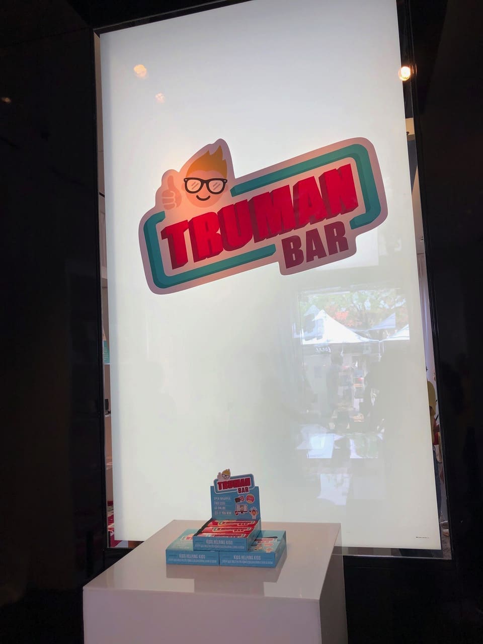 The companies well-known logo welcomes guests to the party.