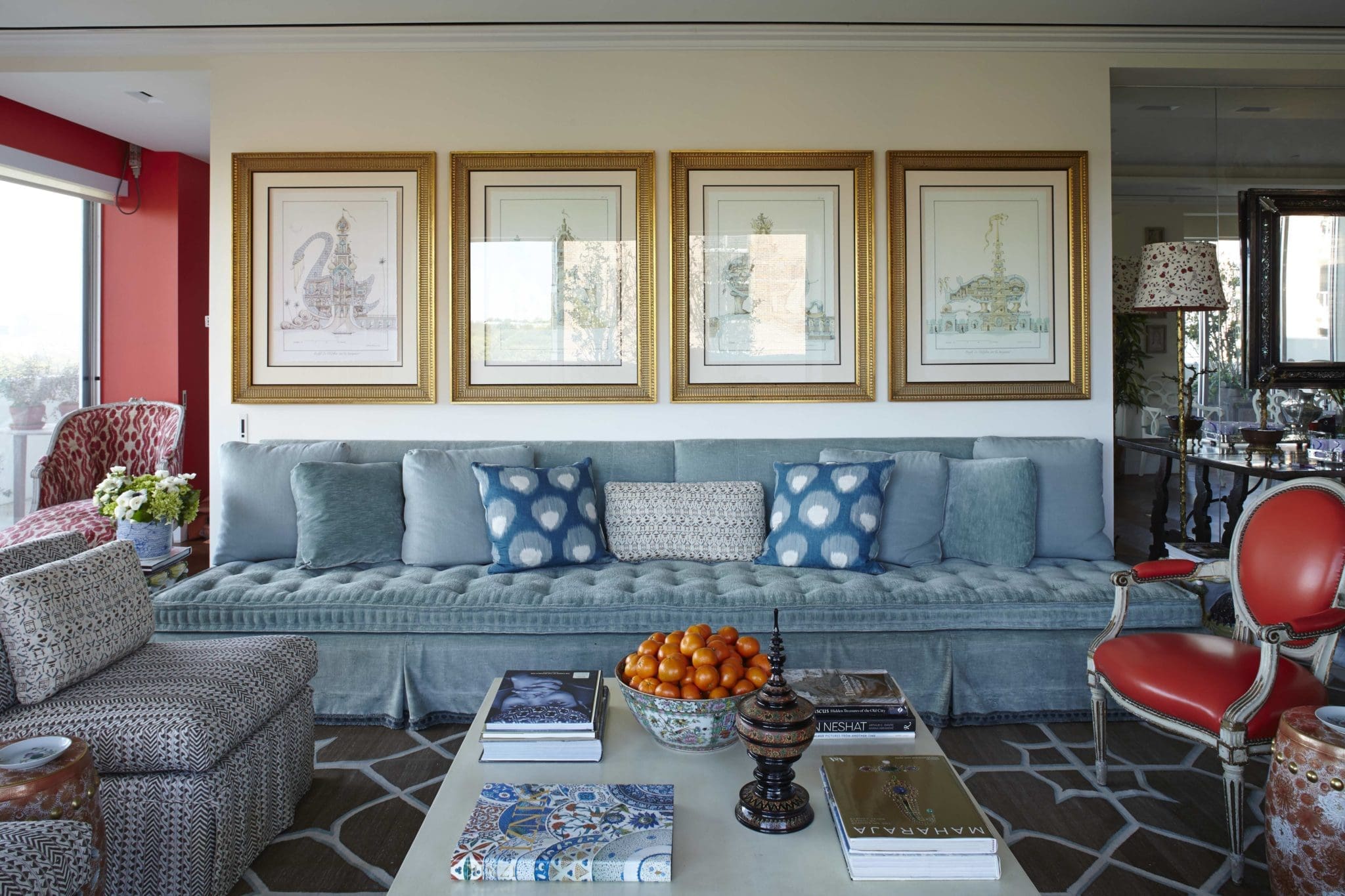In the living area, a banquette by Richard keith Langham in Scalamandré. Luxor by Lisa Fine Textiles covers the slipper chair. Louis XVI-style chair from Nick Brock Antiques.