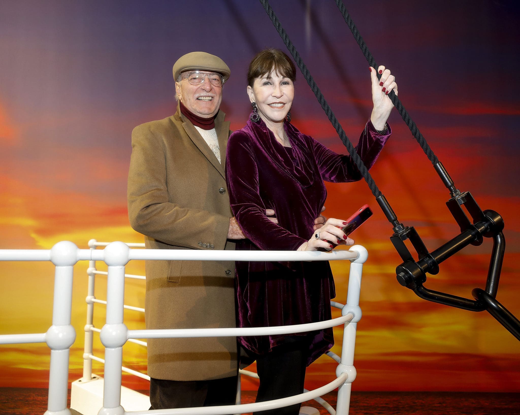 Shafik Rifaat & Shelby Hodge on the bow of the Titantic. (Photo by Bob Levey/Getty Images for Movietopia)