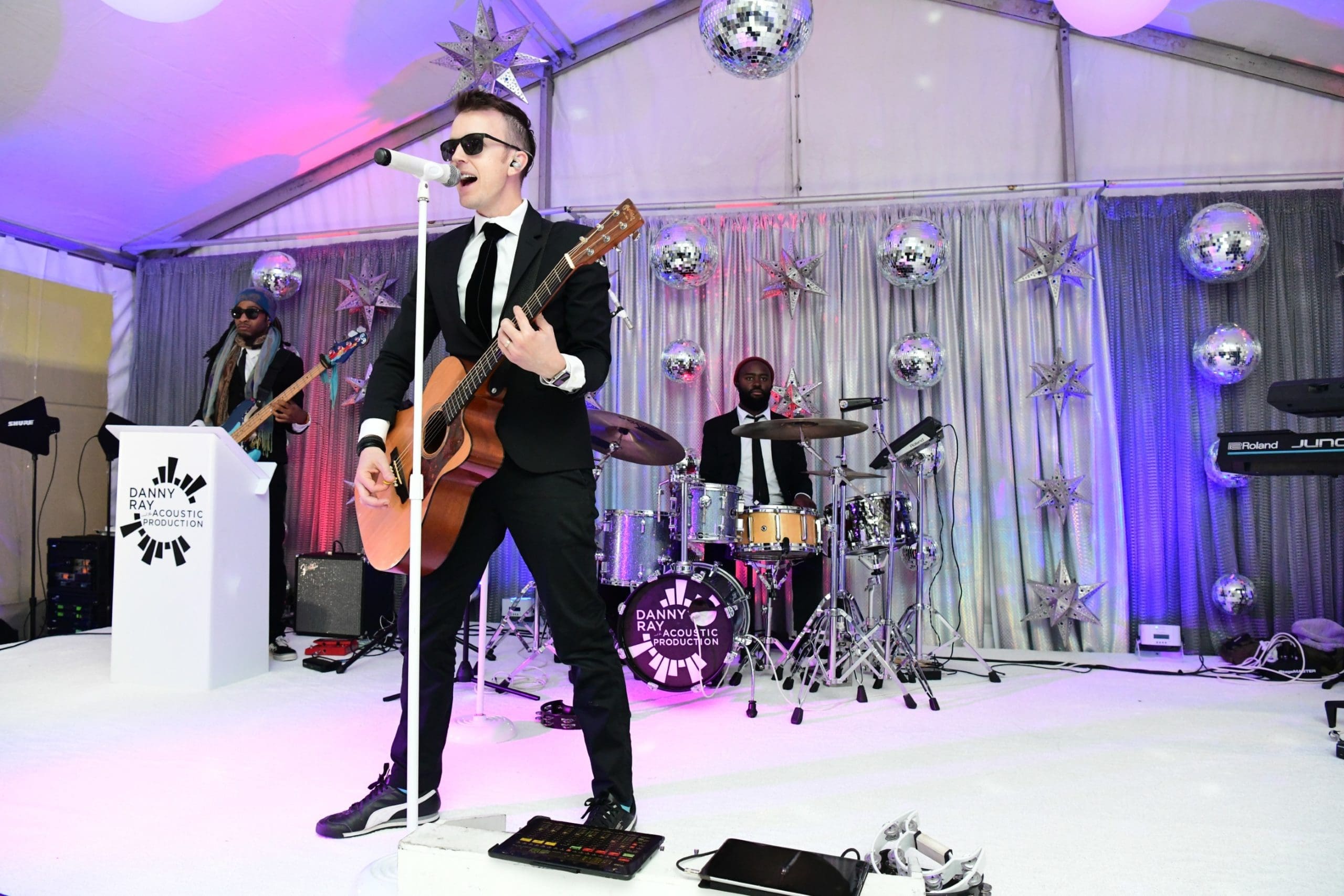 Danny Ray and the Acoustic Production performs at Lewis Jewelers 38th anniversary party. (Photo by Daniel Ortiz)
