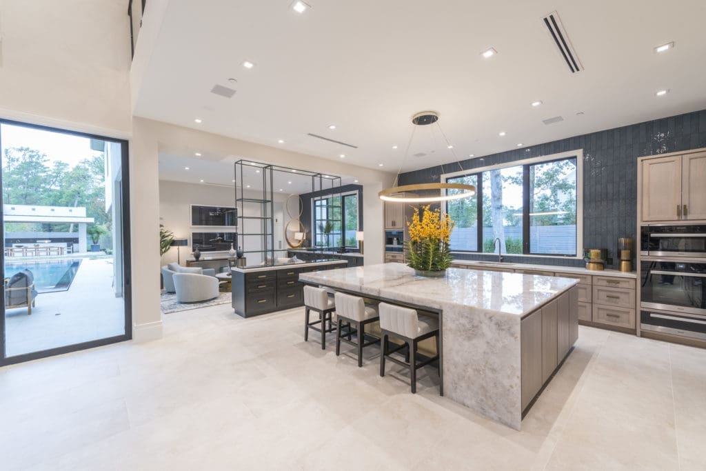 Interior design details from the kitchen to the TV room meet the luxury standards of the Al Ross design. (Photo by Jeff Myers Photography)