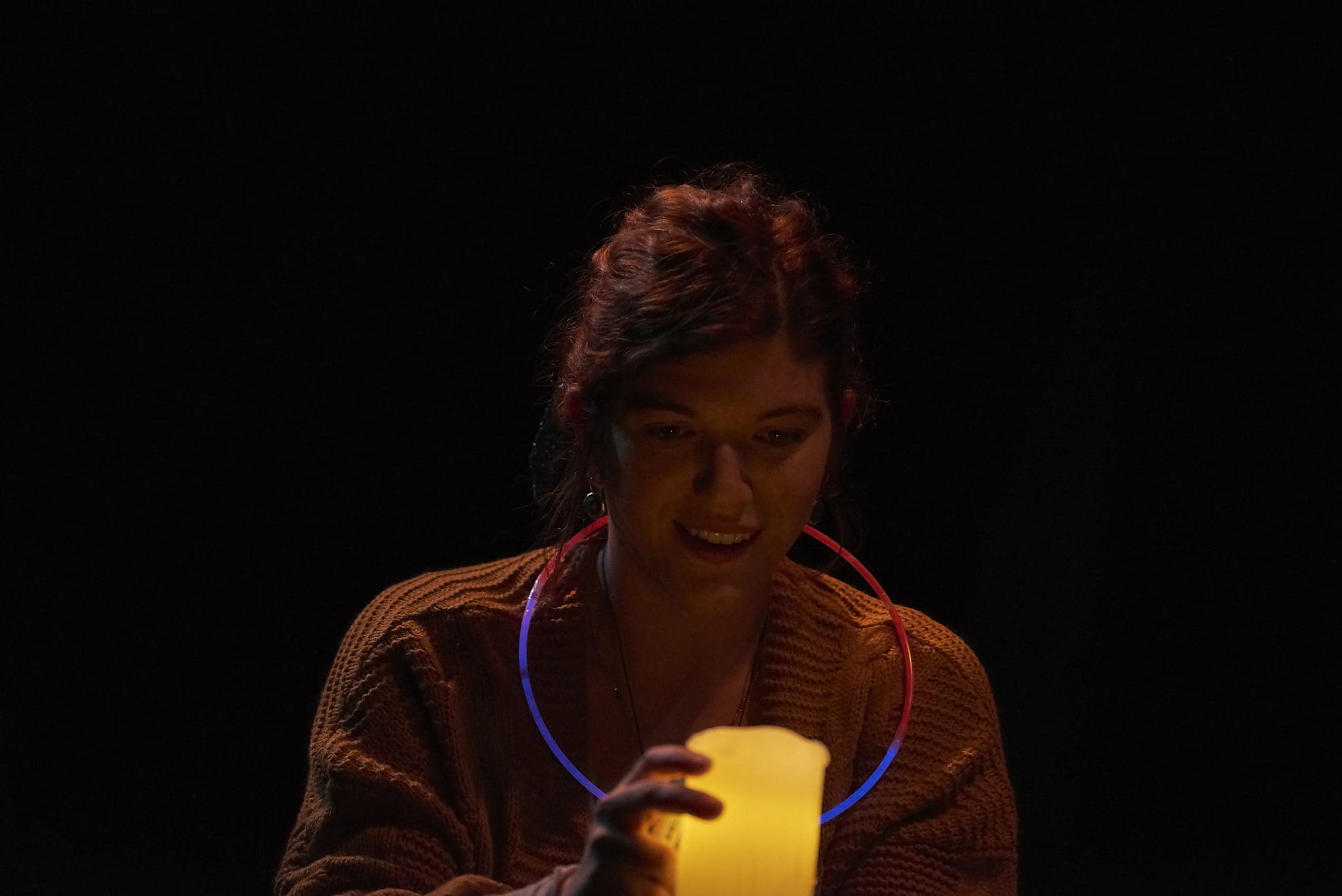 Lighting a candle in the storm in Baby Screams Miracle. (Photo by Anthony Rathbun)